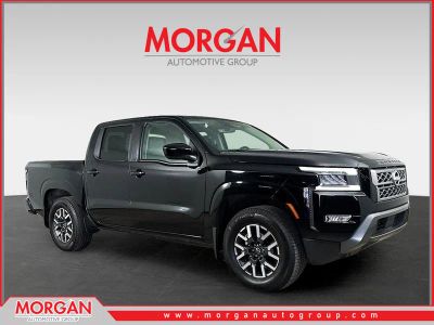 2024 Nissan Frontier SL in Super Black — front three-quarter view