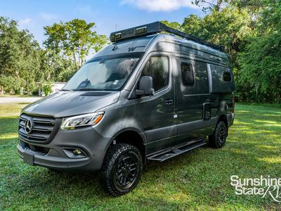 2026 Winnebago Revel — rear three-quarter view
