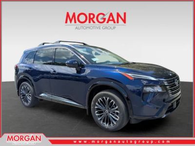 2026 Nissan Rogue Platinum in Blue — front three-quarter view