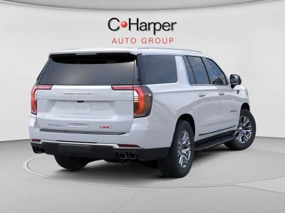 2026 GMC Yukon XL — rear three-quarter view