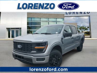 2026 Ford F-150 STX in Iconic Silver Metallic — front three-quarter view