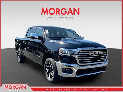 2025 Ram 1500 Laramie in Black — front three-quarter view