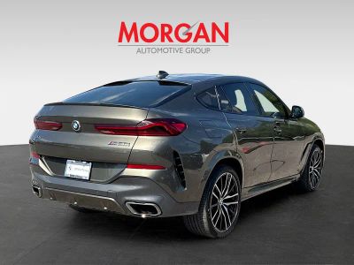 2021 BMW X6 — rear three-quarter view