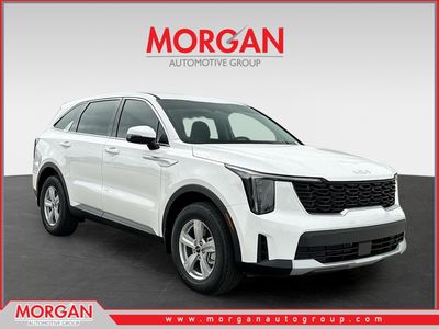 2026 Kia Sorento LX in Glacial White Pearl — front three-quarter view