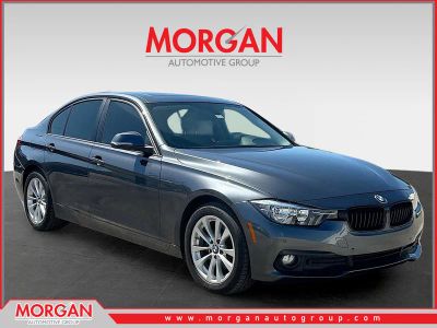 2017 BMW 3 Series 320i in Mineral Gray Metallic — front three-quarter view