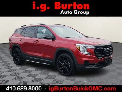2023 GMC Terrain SLE Elevation in Volcanic Red Tintcoat — front three-quarter view