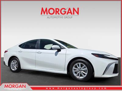 2025 Toyota Camry LE in White — front three-quarter view