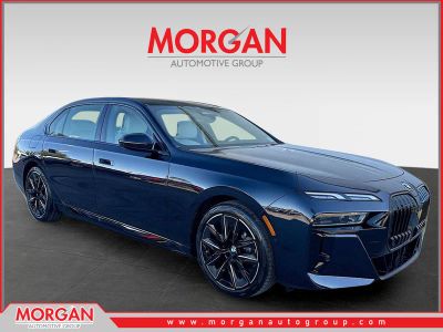 2026 BMW i7 xDrive60 in Carbon Black Metallic — front three-quarter view