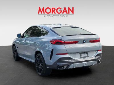 2026 BMW X6 — rear three-quarter view
