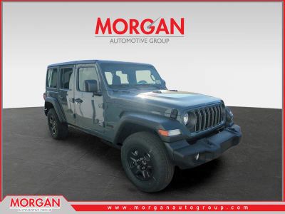 2026 Jeep Wrangler Sport in Gray — front three-quarter view