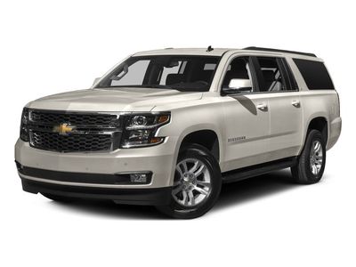 2016 Chevrolet Suburban LT in Champagne Silver Metallic — front three-quarter view