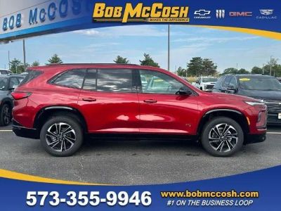 2026 Buick Enclave Sport Touring in Cherry Red Tintcoat — front three-quarter view