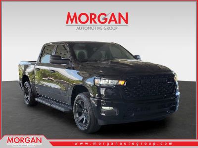 2026 Ram 1500 Express in Diamond Black Crystal Pearlcoat — front three-quarter view