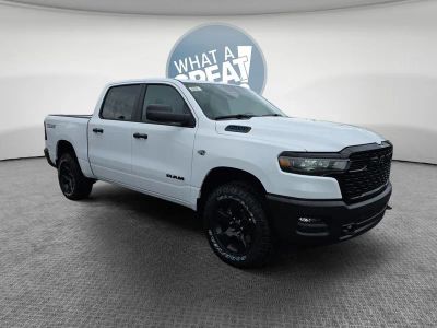 2026 RAM 1500 Warlock in Bright White Clearcoat — front three-quarter view
