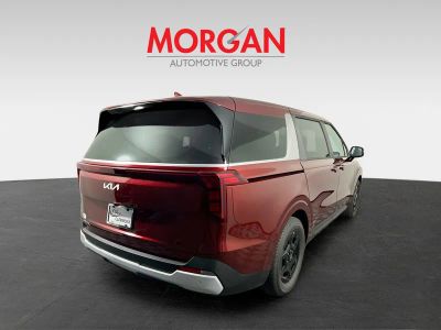 2026 Kia Carnival — rear three-quarter view