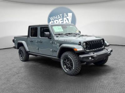 2026 Jeep Gladiator GLADIATOR WILLYS 4X4 in Anvil Clear-Coat Exterior Paint — front three-quarter view