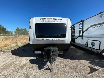 2025 Forest River RV ALPHA WOLF — rear three-quarter view