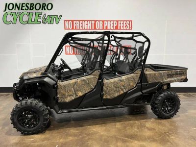 2023 Honda® Pioneer 1000-6 Deluxe Crew Camo — front three-quarter view