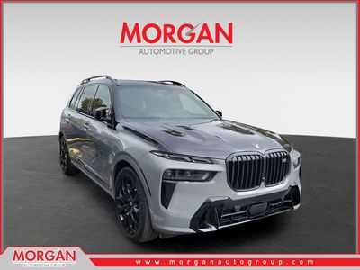 2023 BMW X7 M60i in Lime — front three-quarter view