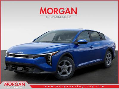 2025 Kia K4 LXS in Deep Sea Blue — front three-quarter view