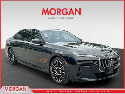 2024 BMW i7 xDrive60 in Black Sapphire Metallic — front three-quarter view
