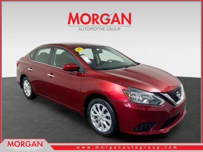 2019 Nissan Sentra SV in Scarlet Ember Tintcoat — front three-quarter view