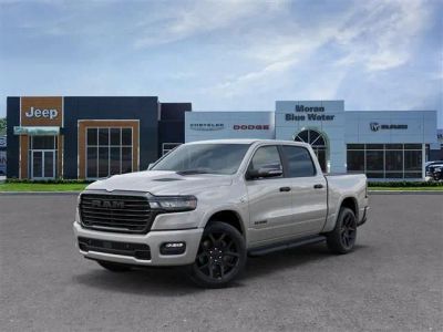 2026 RAM Ram 1500 RAM 1500 LARAMIE CREW CAB 4X4 5'7' BOX in Silver Zynith Exterior Paint — front three-quarter view