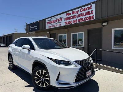 2021 Lexus RX 350 in White — front three-quarter view