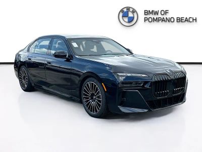 2026 BMW i7 eDrive50 in Carbon Black Metallic — front three-quarter view