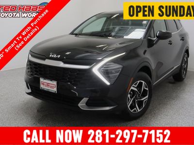 2024 Kia Sportage AWD LX 2.5L in Fusion Black — front three-quarter view