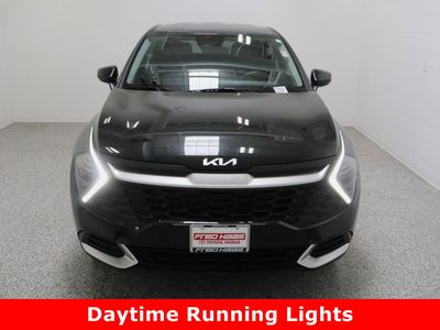 2024 Kia Sportage AWD — rear three-quarter view