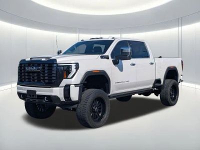 2024 GMC Sierra 2500HD Denali Ultimate in White — front three-quarter view