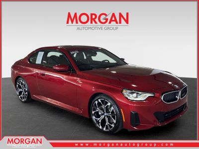 2025 BMW 2 Series 230i in Red — front three-quarter view