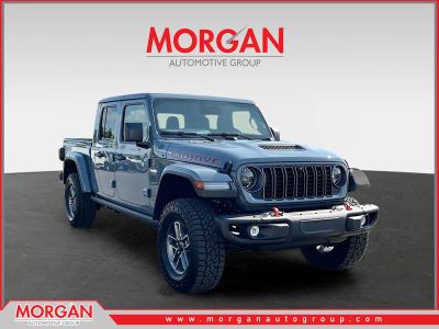 2026 Jeep Gladiator Mojave in Gray — front three-quarter view