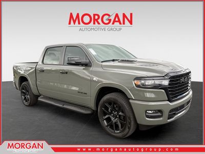 2026 Ram 1500 Laramie in Green — front three-quarter view