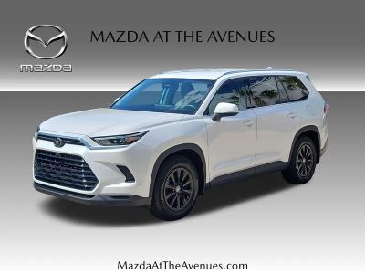 2024 Toyota Grand Highlander XLE in Beige — front three-quarter view