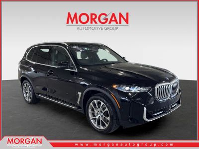 2025 BMW X5 xDrive40i in Black — front three-quarter view