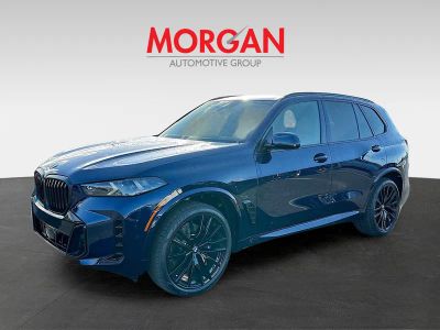2026 BMW X5 — rear three-quarter view