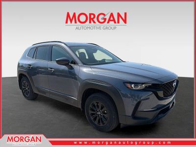 2026 Mazda CX-50 Hybrid Premium in Polymetal Gray Metallic — front three-quarter view