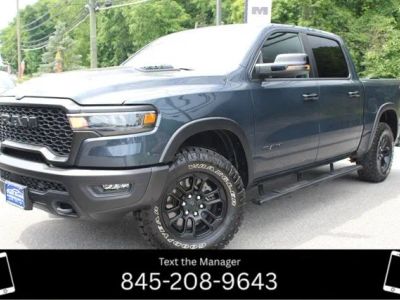 2025 RAM 1500 Rebel in Forged Blue Metallic — front three-quarter view