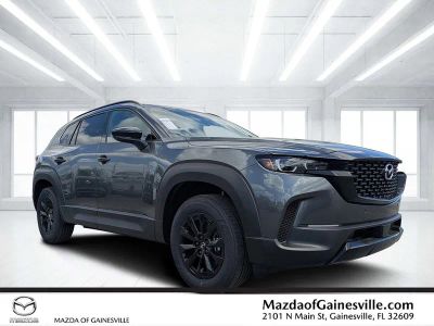 2026 Mazda CX-50 Hybrid Premium in Gray — front three-quarter view