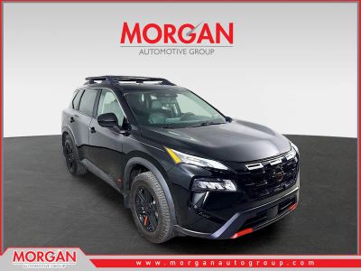 2025 Nissan Rogue Rock Creek in Super Black — front three-quarter view