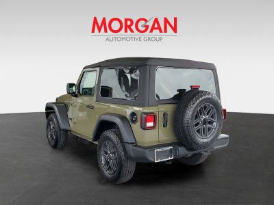 2026 Jeep Wrangler — rear three-quarter view