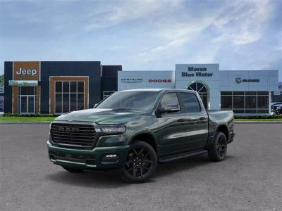 2026 RAM Ram 1500 RAM 1500 LARAMIE CREW CAB 4X4 5'7' BOX in Serrano-Green Metallic Exterior Paint — front three-quarter view