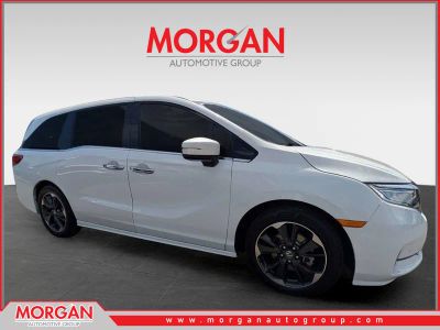 2024 Honda Odyssey Elite in Platinum White Pearl — front three-quarter view