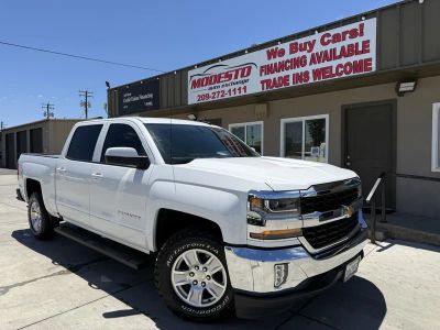 2018 Chevrolet Silverado 1500 in White — front three-quarter view