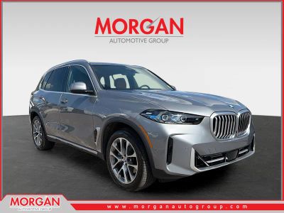 2026 BMW X5 sDrive40i in Skyscraper Grey Metallic — front three-quarter view