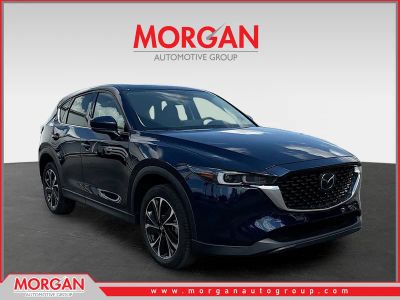 2023 Mazda CX-5 2.5 S Premium Plus Package in Deep Crystal Blue Mica — front three-quarter view