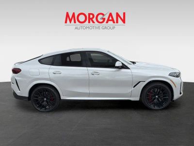 2026 BMW X6 — rear three-quarter view