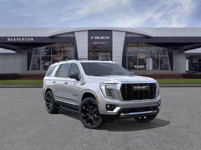 2026 GMC Yukon Denali in Sterling Metallic — front three-quarter view